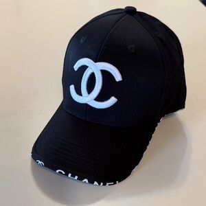 CHANEL Black Hat with White Emblem